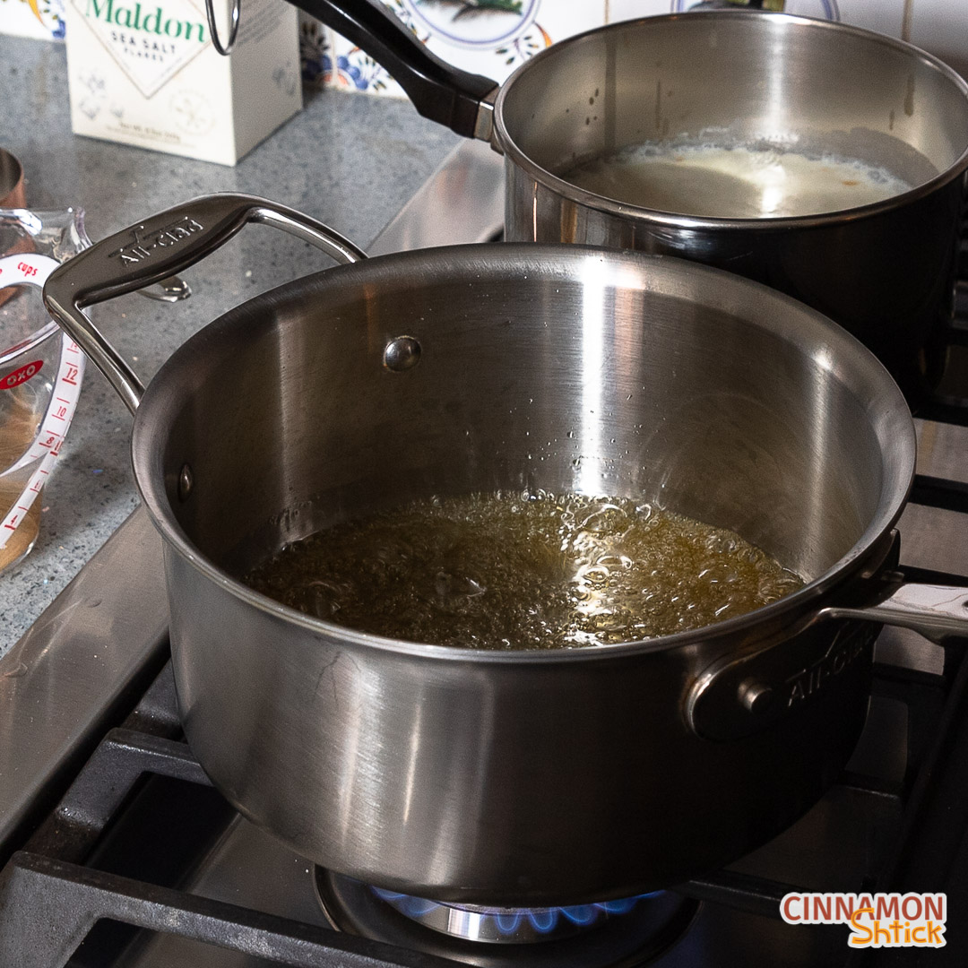 Sugar almost reaching the caramel stage, cooking in pot