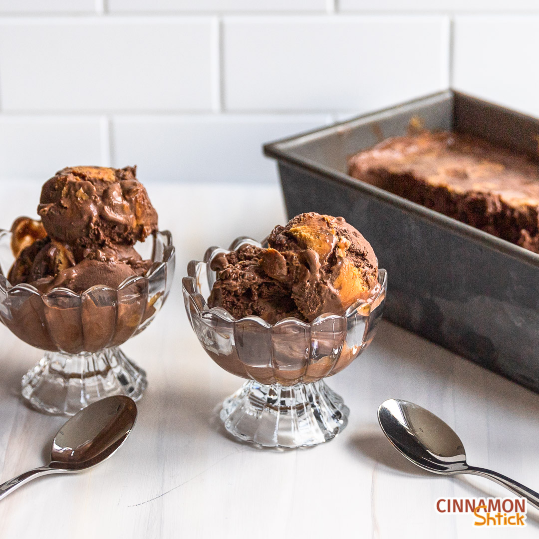 two ice cream dishes with scoops of chocolate peanut butter ice cream