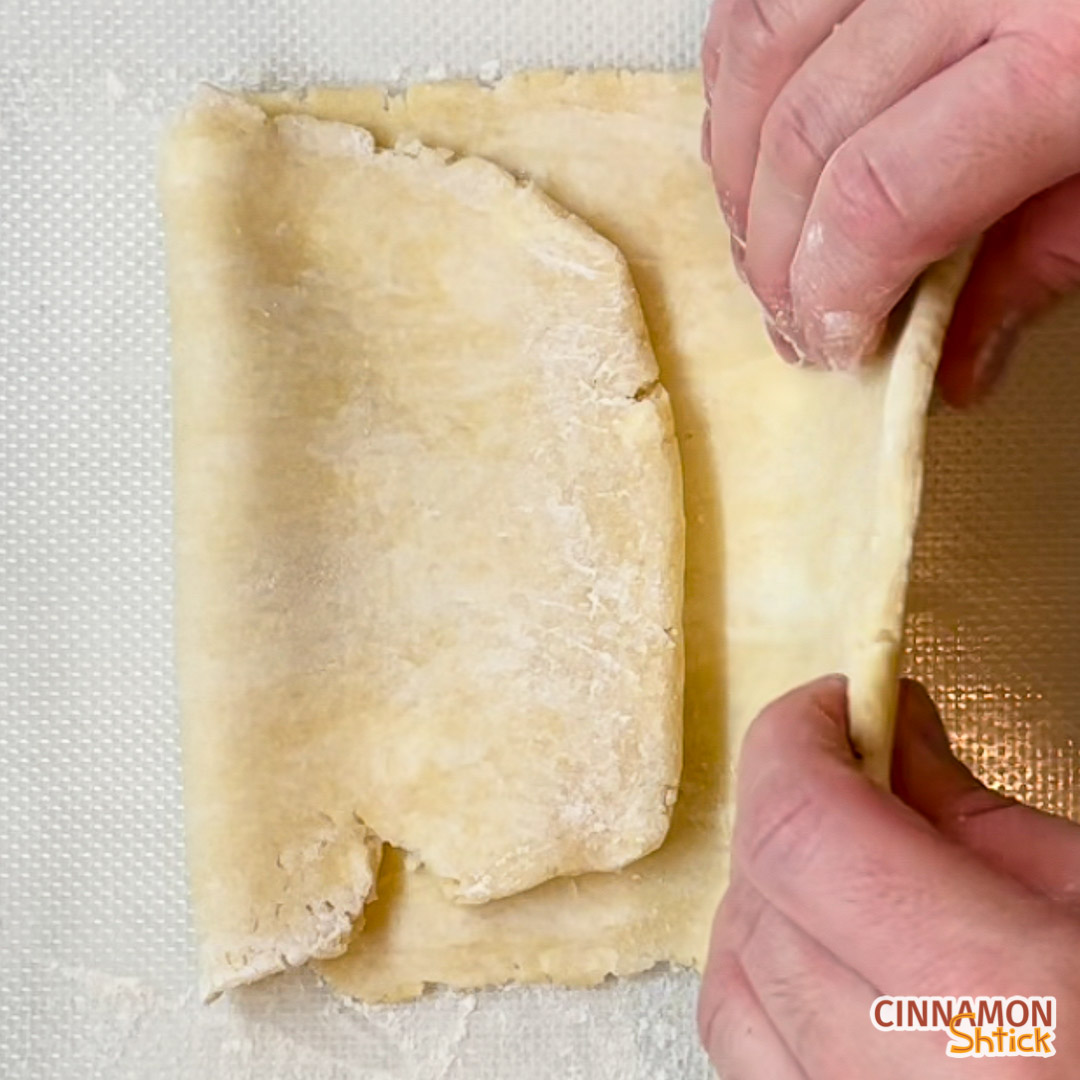 Dough being folded over onto itself