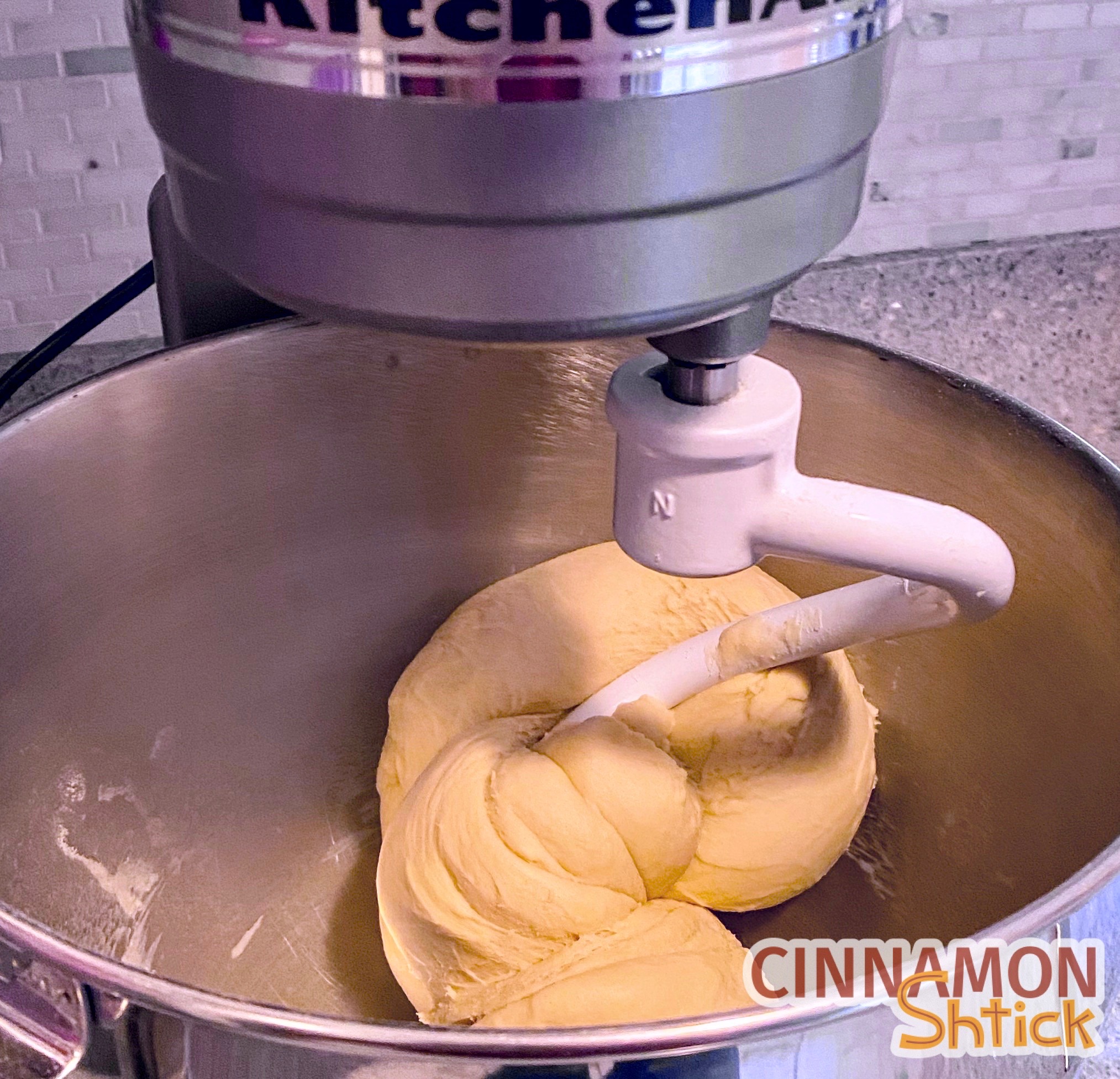 Babka dough being kneaded in mixer