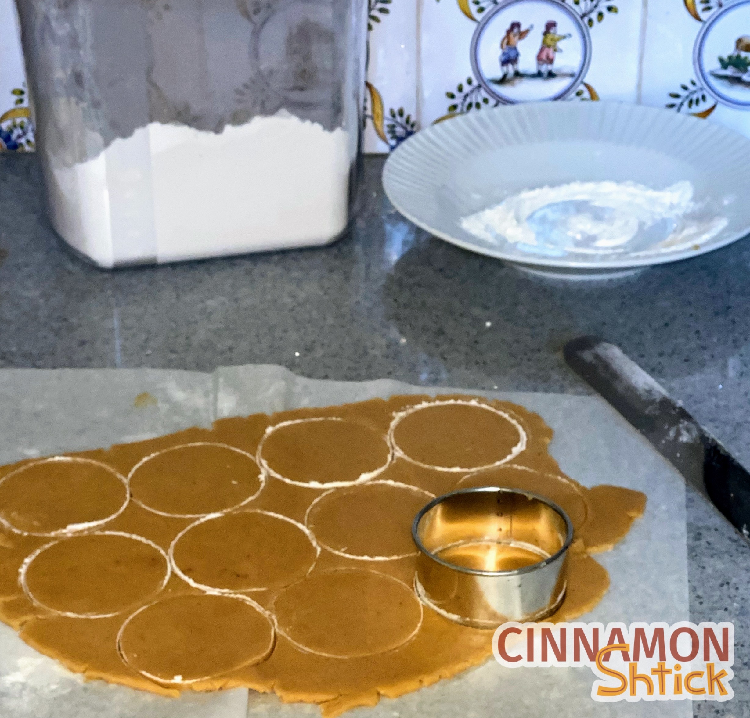 dough rolled out cut with circle cookie cutter