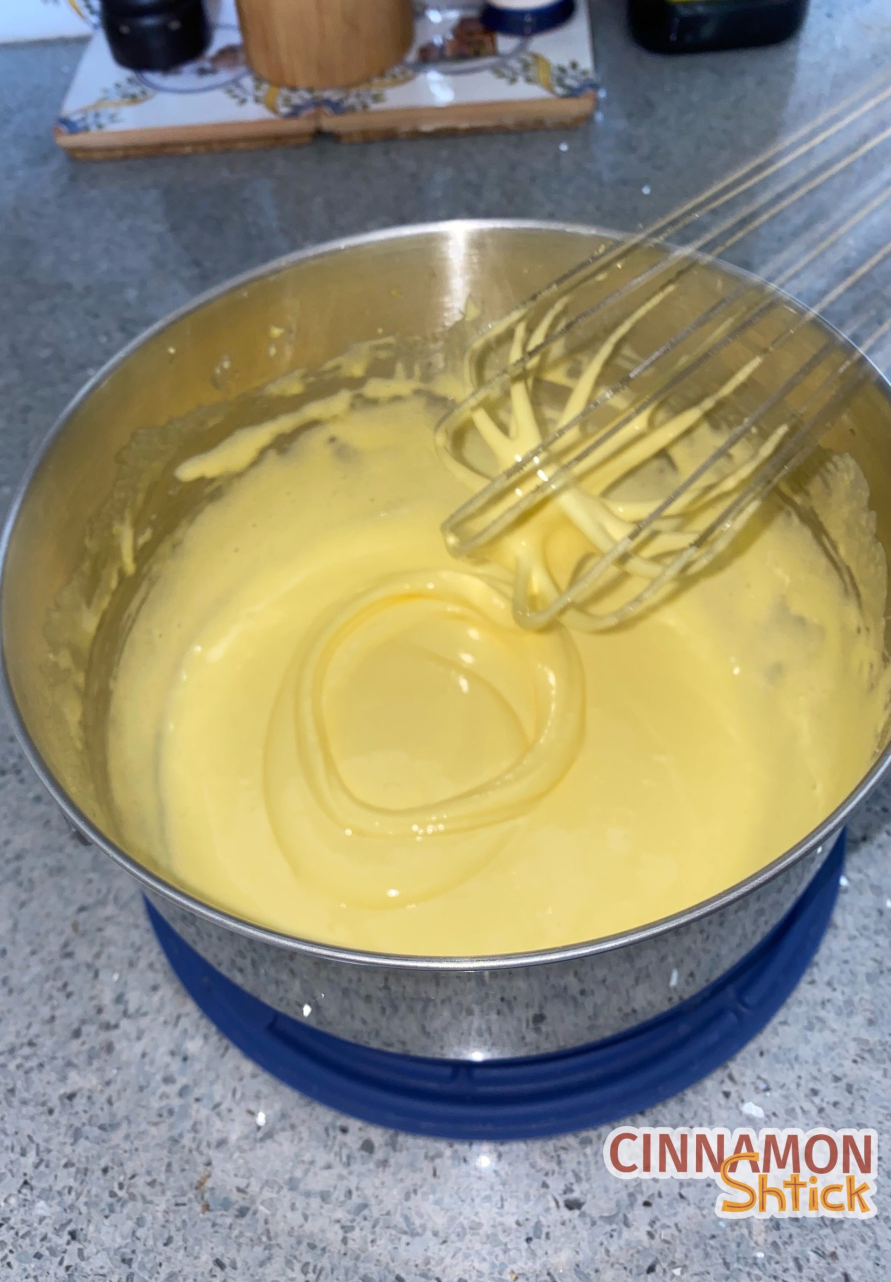 egg yolks whisked with sugar, pale yellow and forming a ribbon on itself