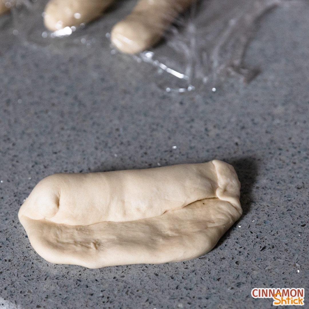 top third of dough folded over the onions