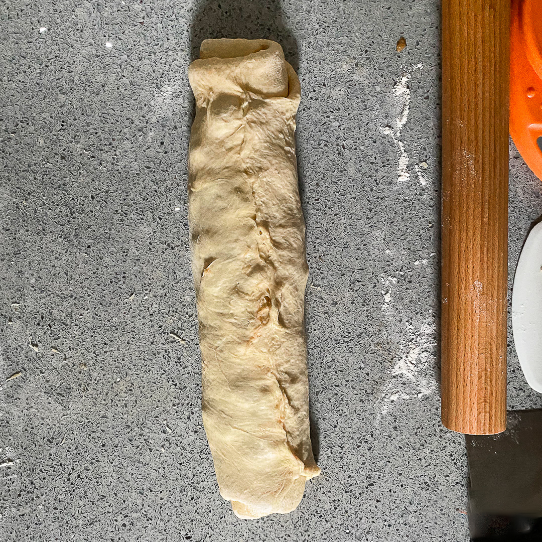 Apple Honey Babka dough rolled up like a jelly roll