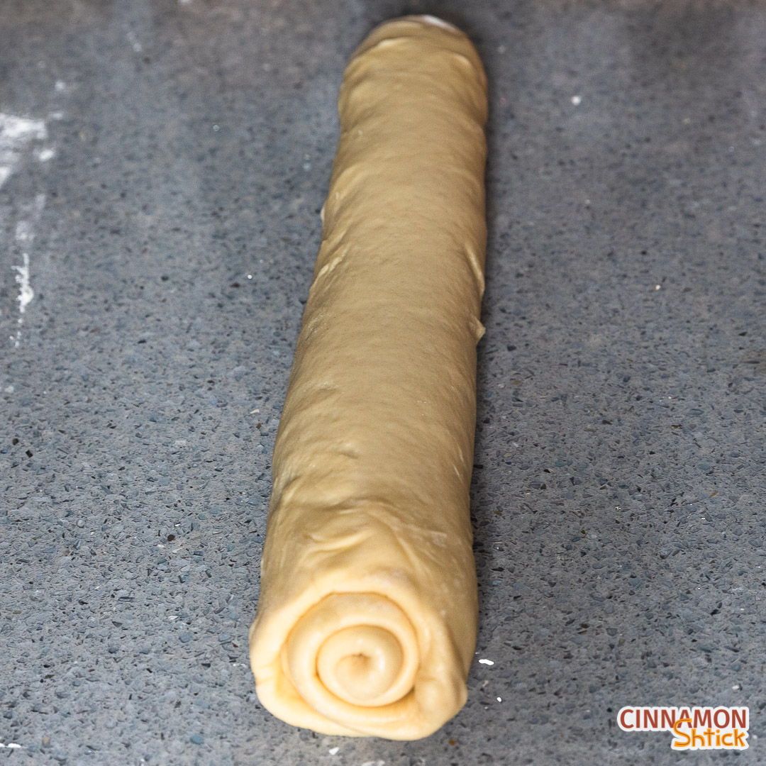Babka dough rolled into a log