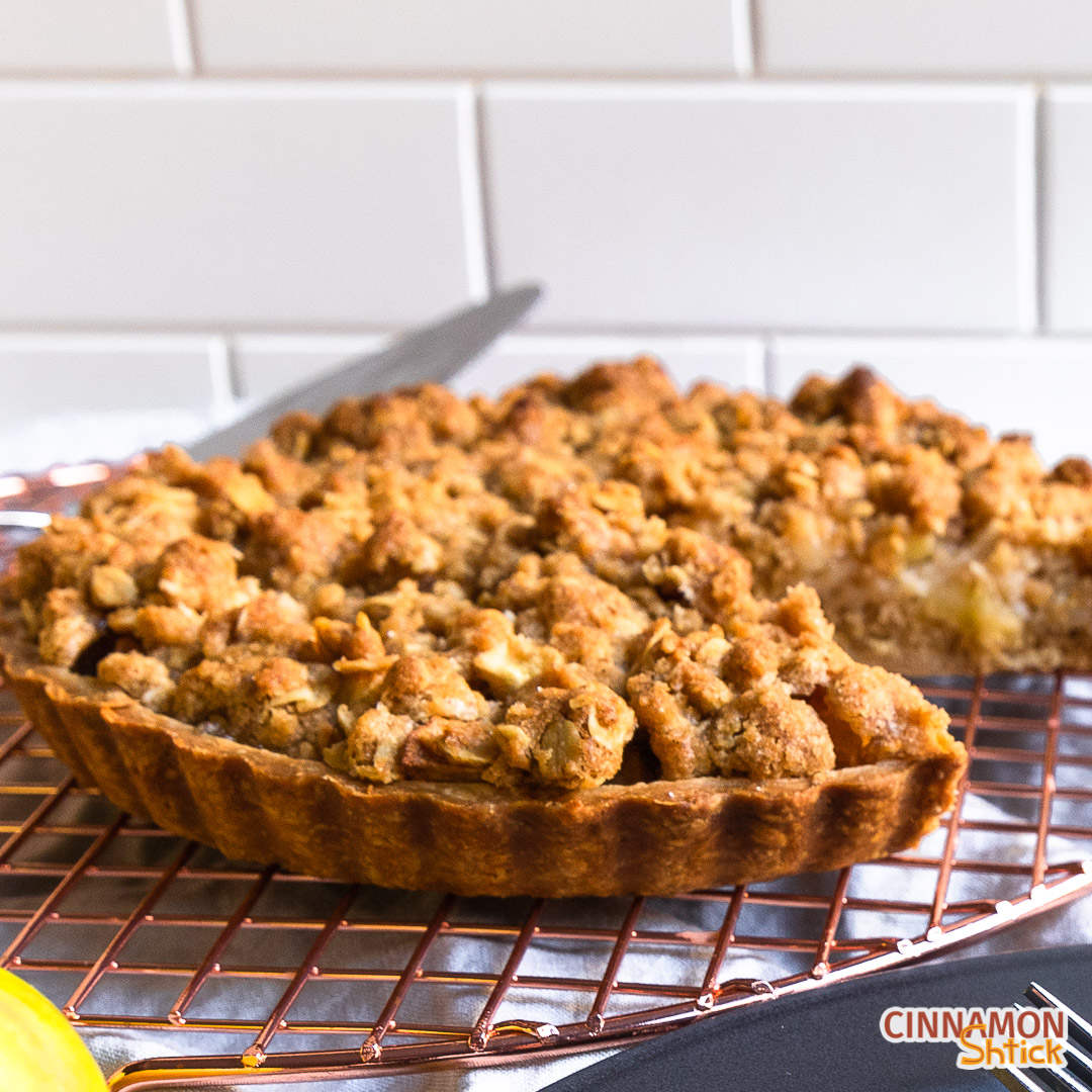 apple oatmeal tart on cooling rack