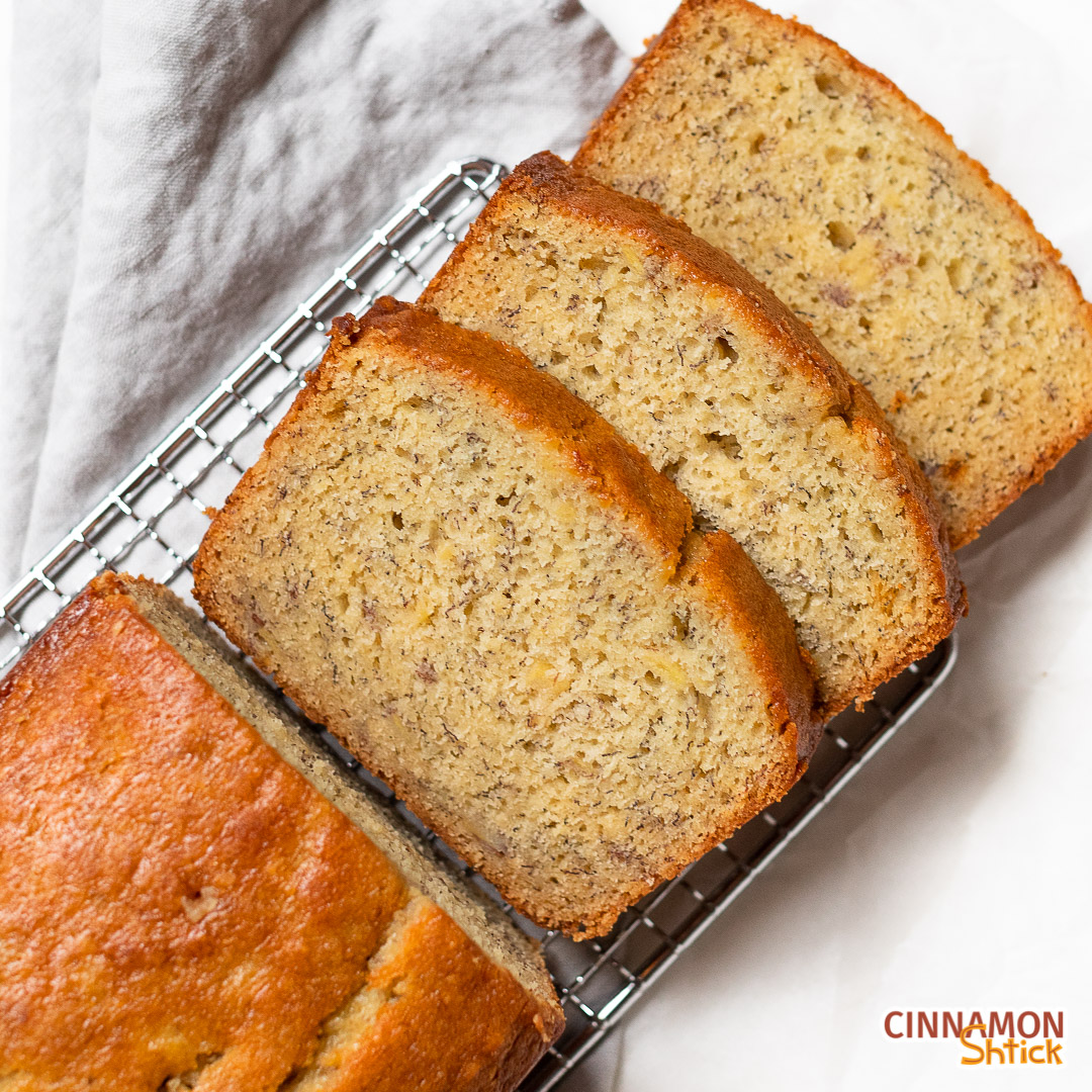 three slices of banana bread on cooling rack