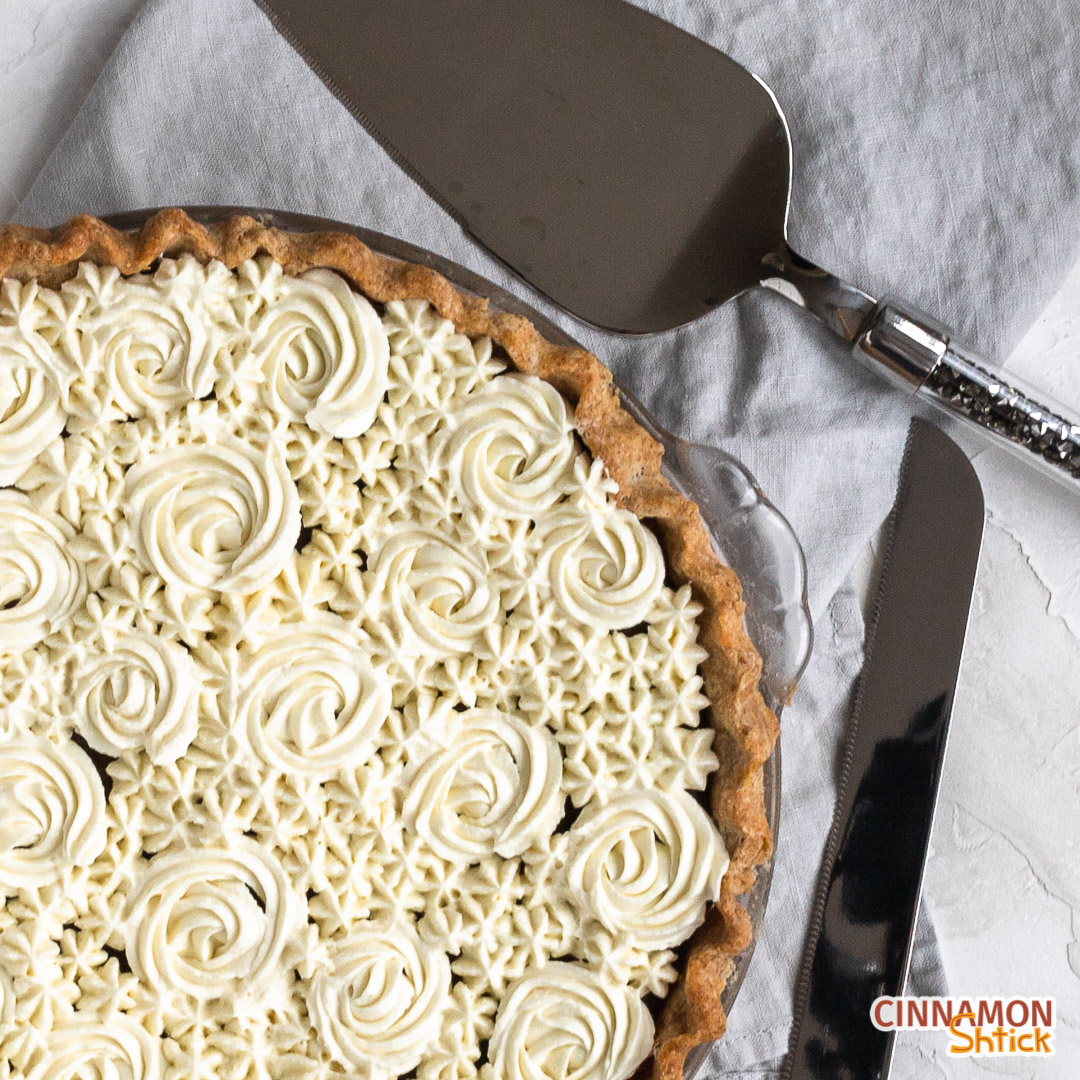 white chocolate whipped ganache piped on top of pie