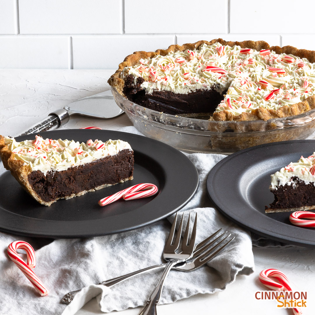 Two plated slices of deep dish brownie pie