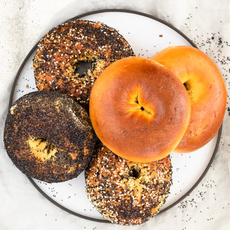 overhead view of egg bagels on a plate