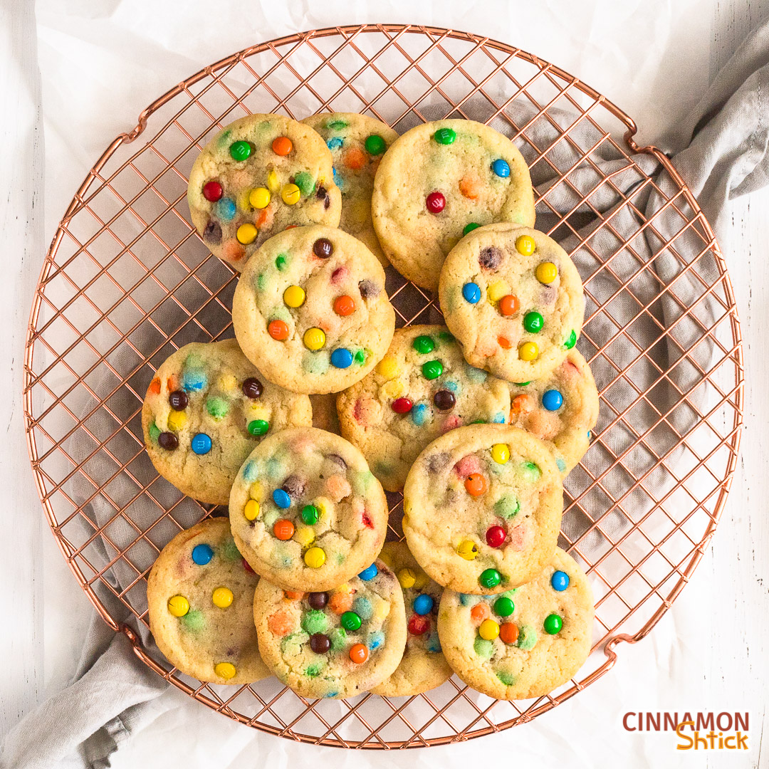 M&M Cookies on round cooling rack