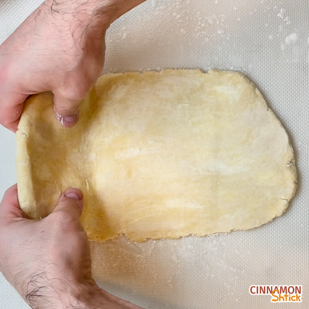 Dough being folded onto itself