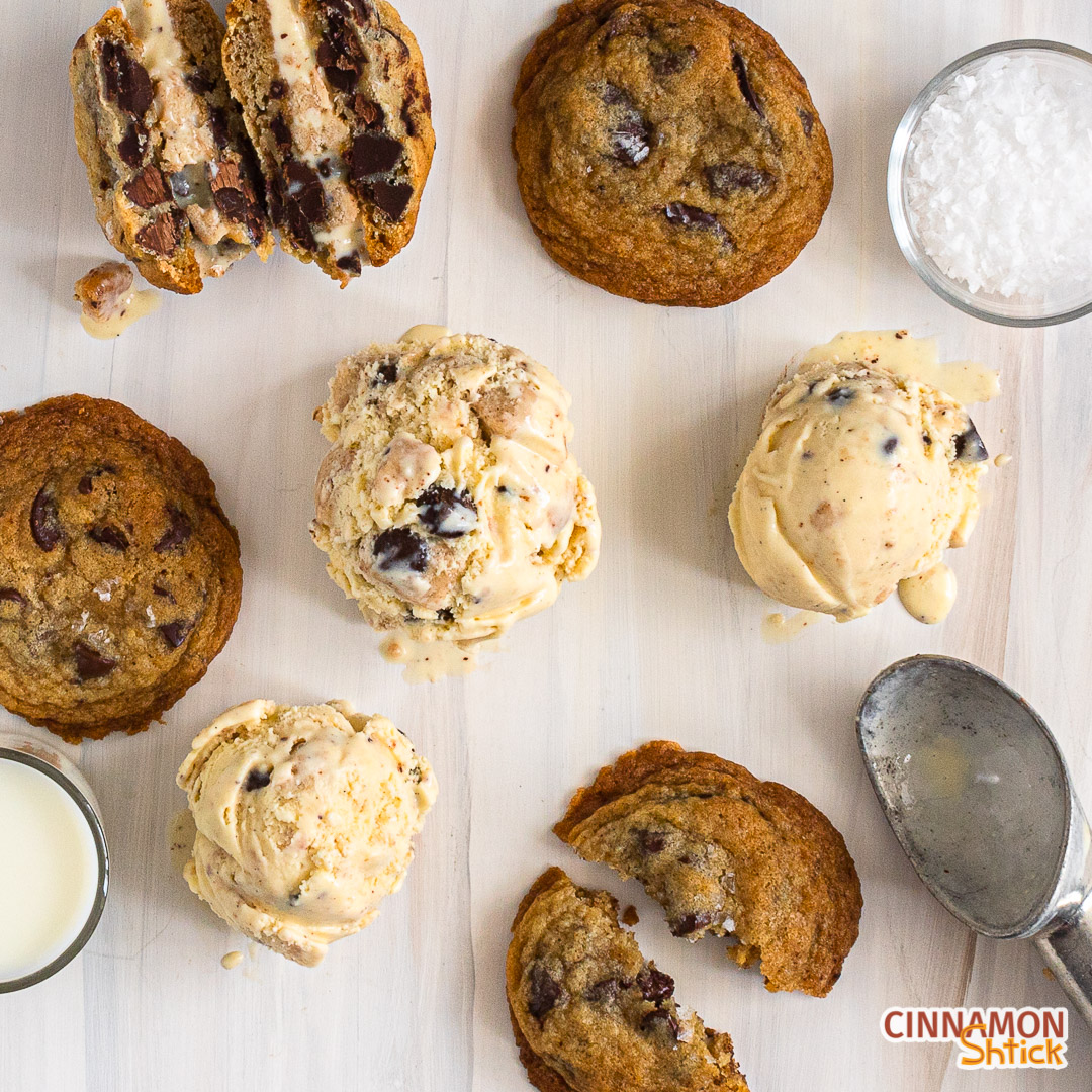 3 scoops of brown butter chocolate chip cookie dough ice cream on counter with three brown butter chocolate chip cookies and an ice cream sandwich cut in half