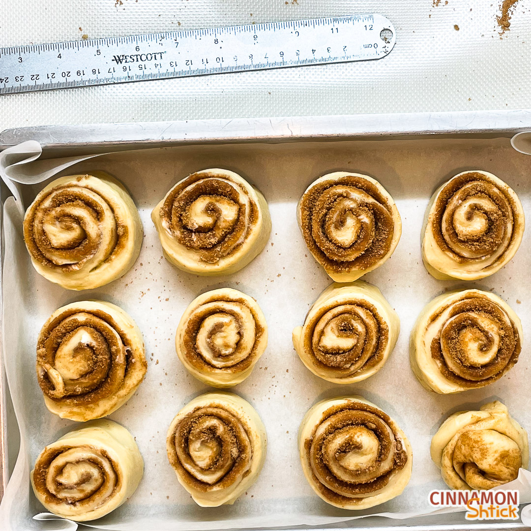cinnamon rolls placed in pan before rising