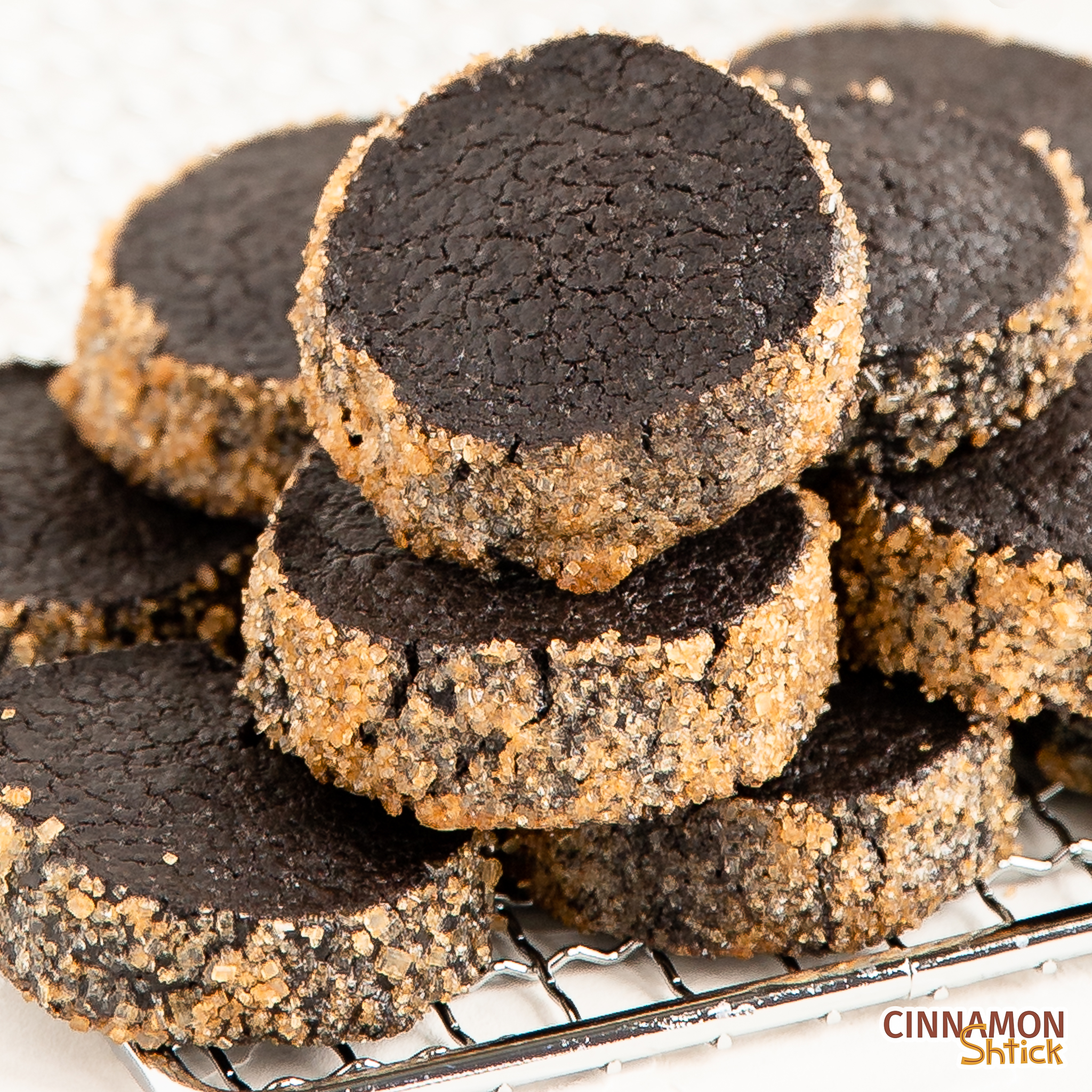 black cocoa diamants piled up on a cooling rack