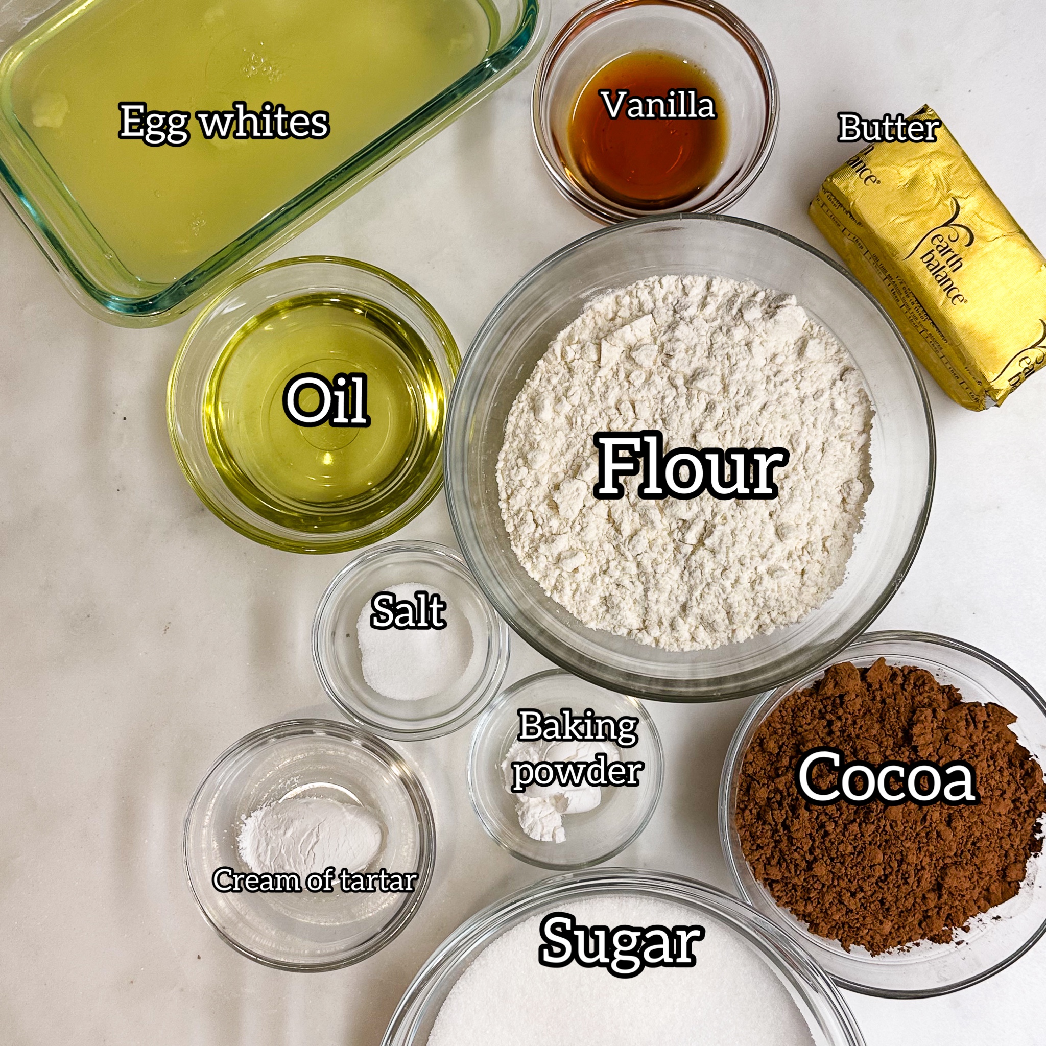 overhead view of all of the ingredients for chocolate egg white cake