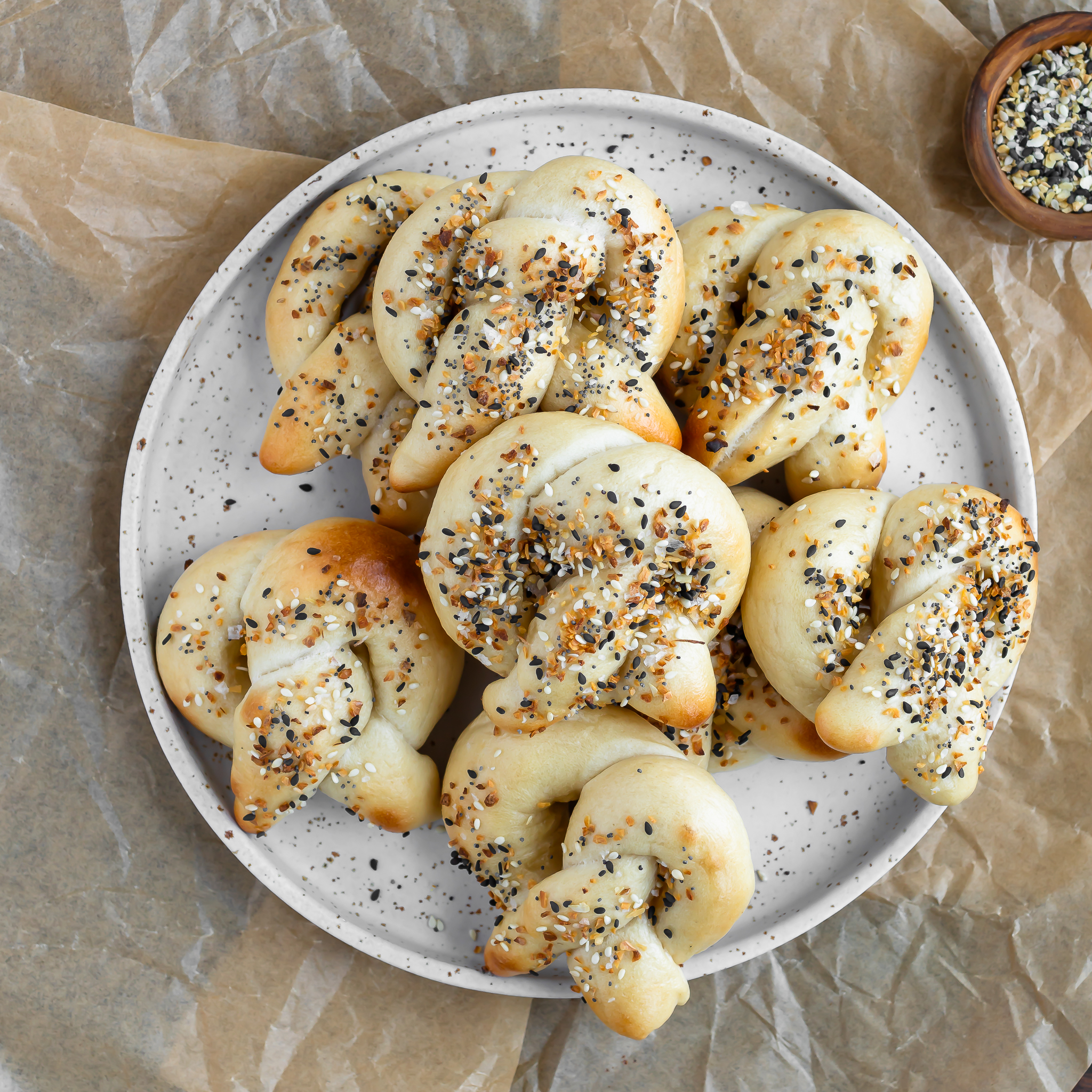 overhead view of sourdough discard pretzels piled on a round plate