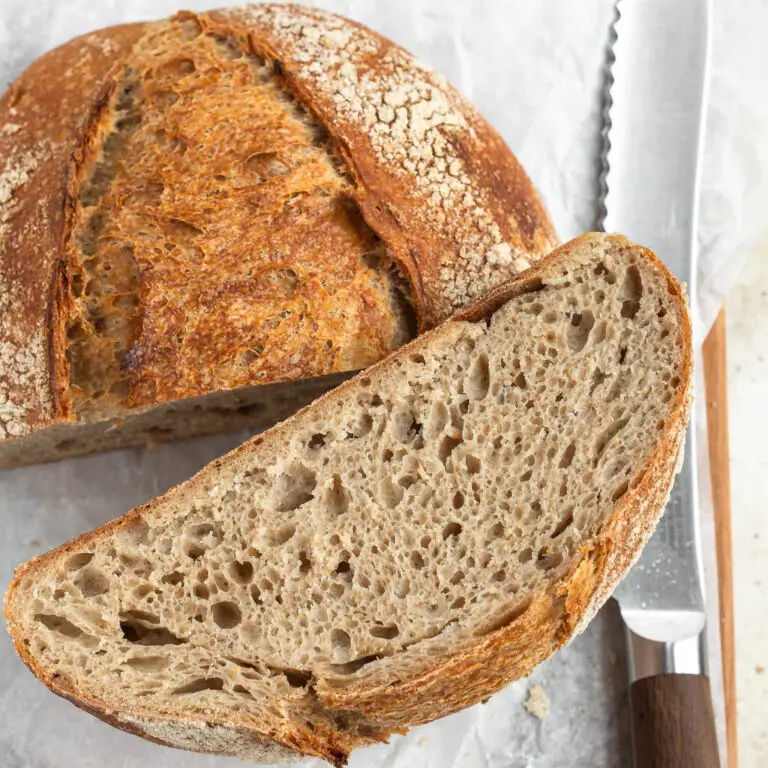 Overhead view of sourdough bread showing crumb shot and top crust