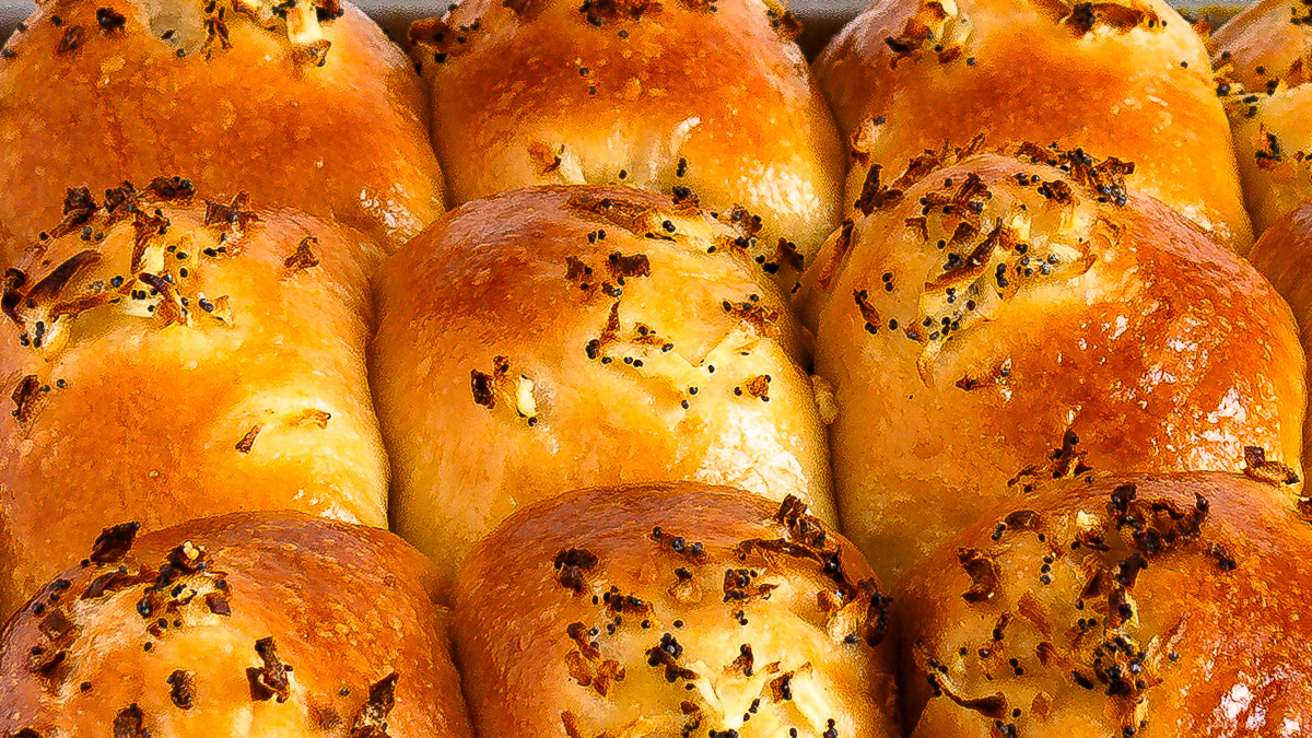 Overhead of baked onion rolls.